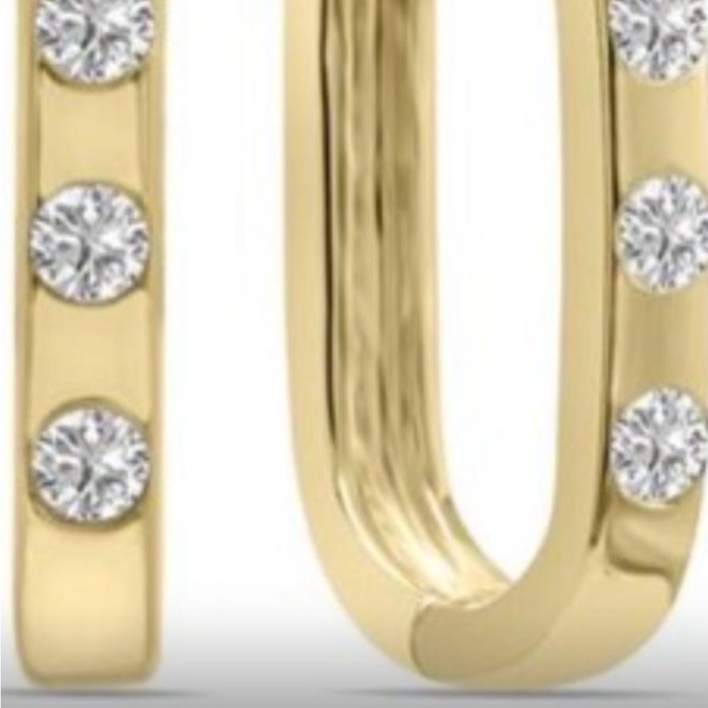 14k gold tiny Huggies lab diamond earrings. Available in 14k white gold as well.
